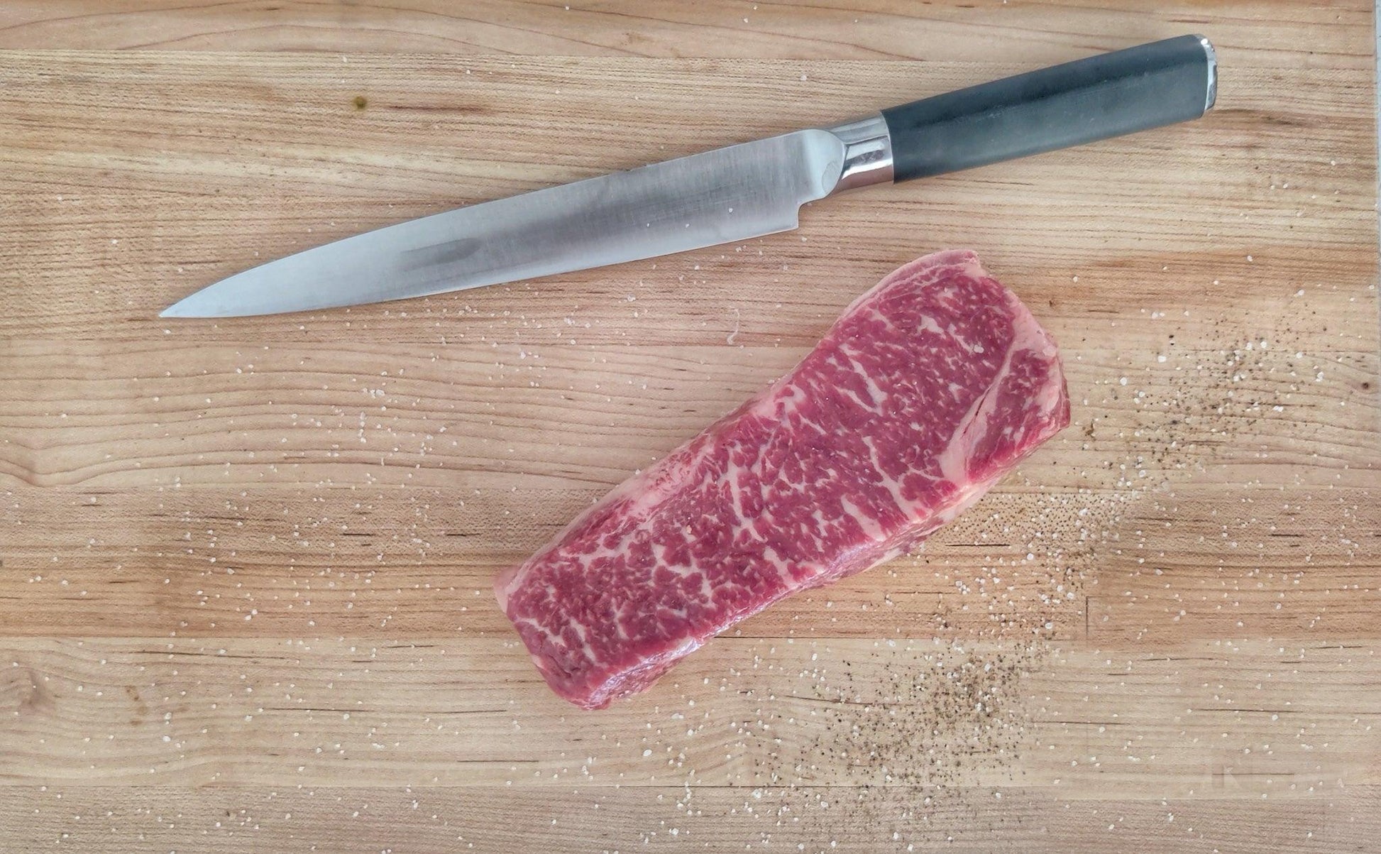 New York Strip Steak | Wagyu-Angus Cross - Meat N' Bone